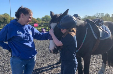 Kady with a young rider and horse