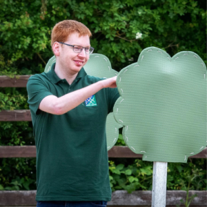 Matt helping out with the Countryside Challenge course wearing a dark green Scropton branded logo polo.