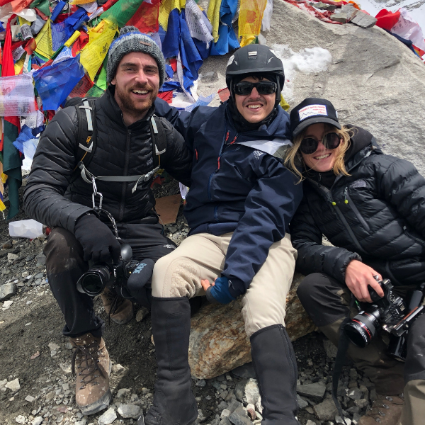 Carl Woods and Max Stainton sit as they celebrate reaching Everest Base Camp.