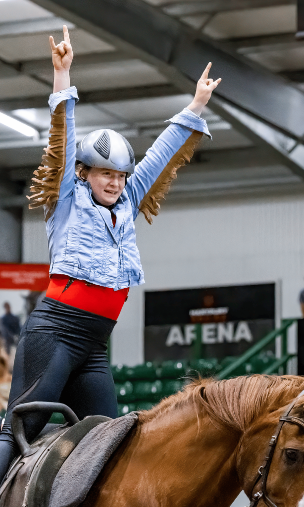 Vaulting coach and rider on horse