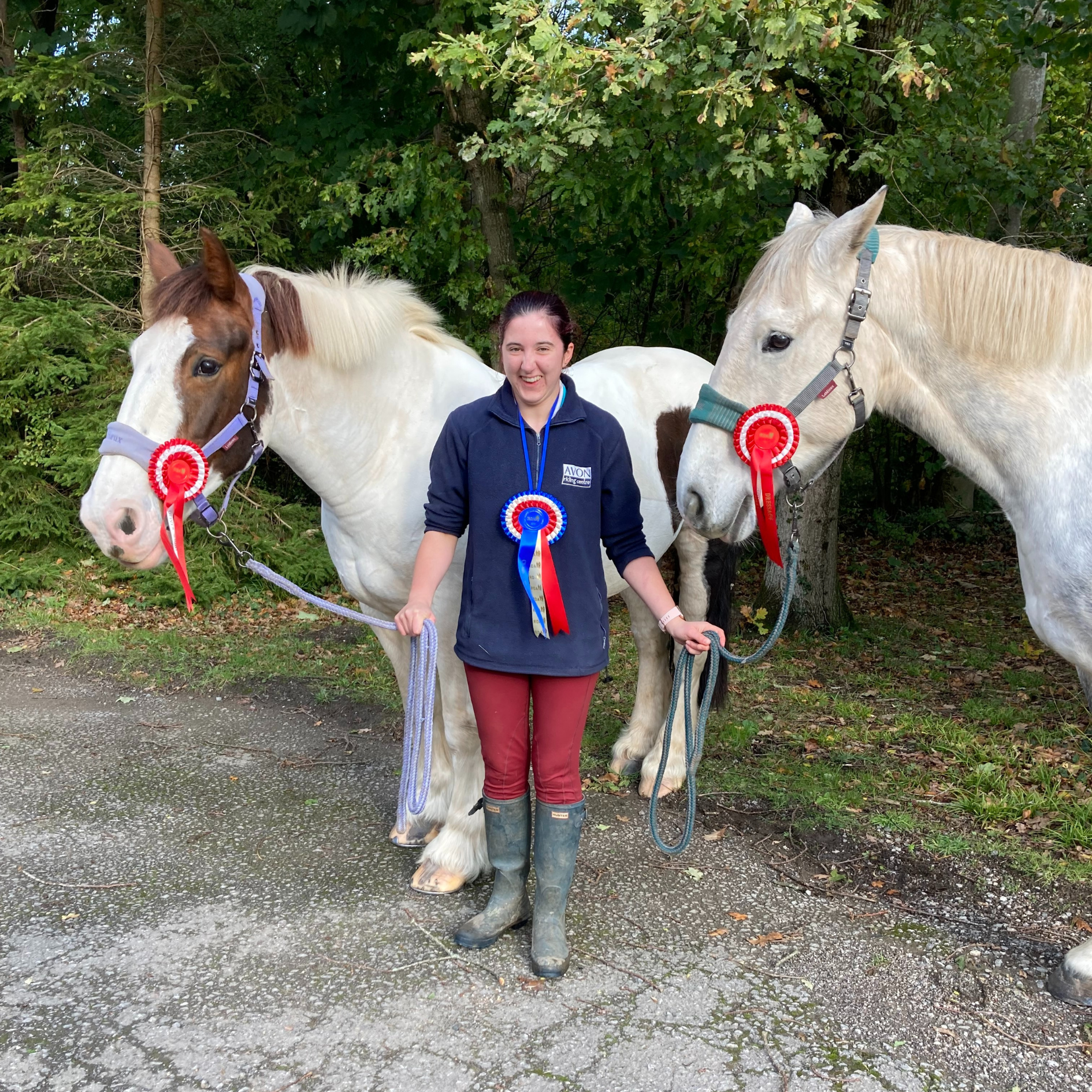 Millie stood holding two RDA horses