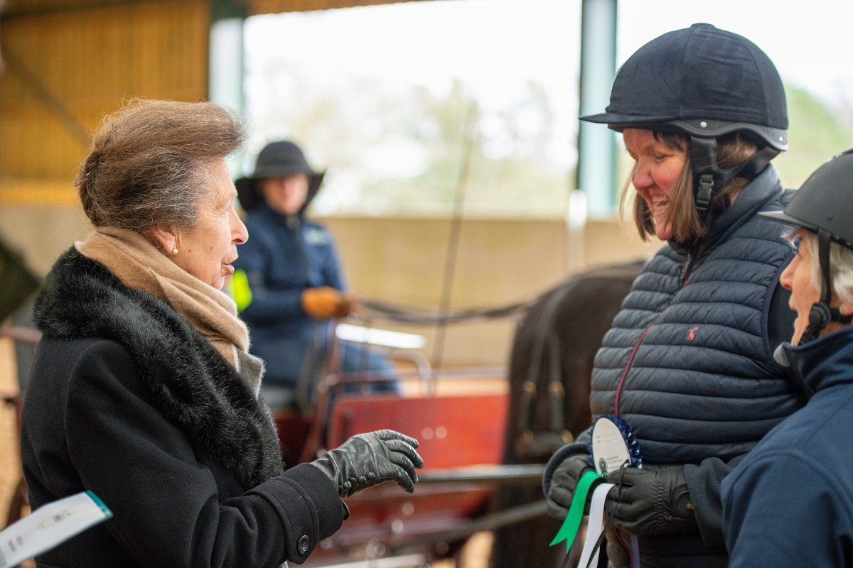 HRH chatting with a participant